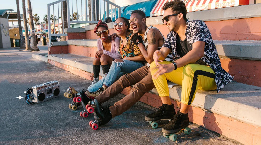 Roller skating is back.  A group of friends roller skating together.